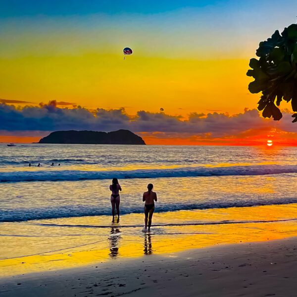 Two Costa Rica Hot ladies walking on the beach at Sundown.