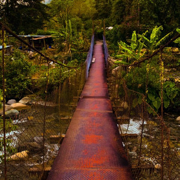 A rusty Panama over a river.